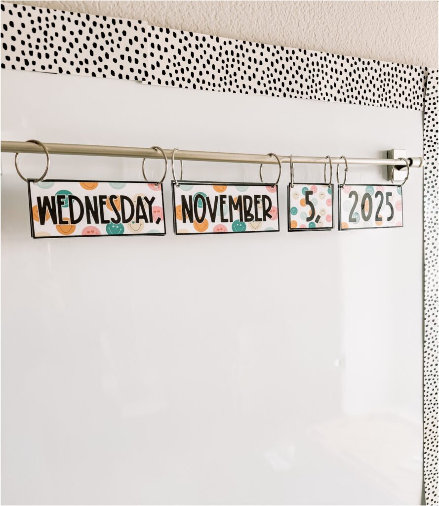 This image shows a classroom flip calendar in a retro groovy theme with smiley faces.