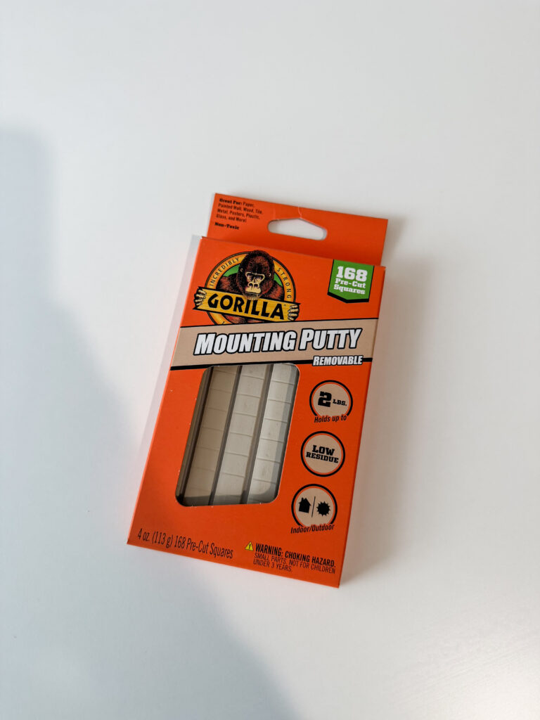 This image shows a package of gorilla mounting putty. 