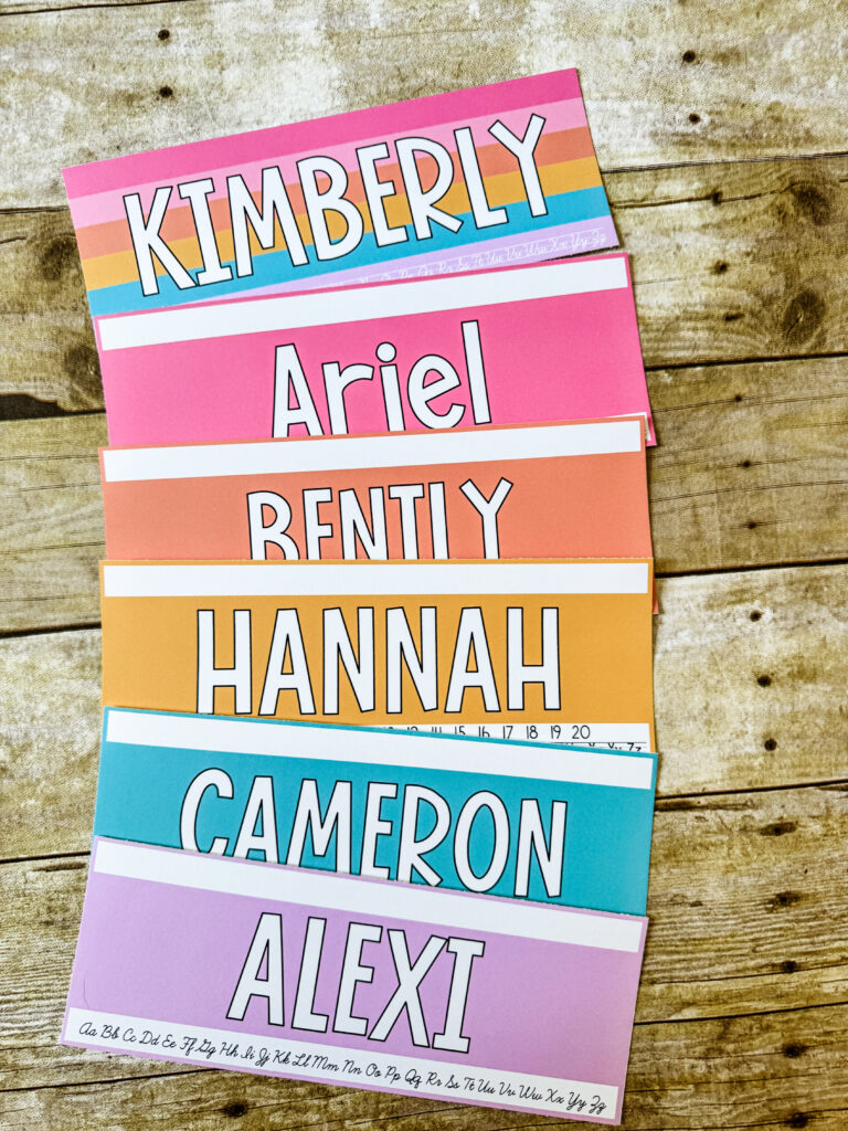 This image shows desk name plates in a hello, pastel theme.