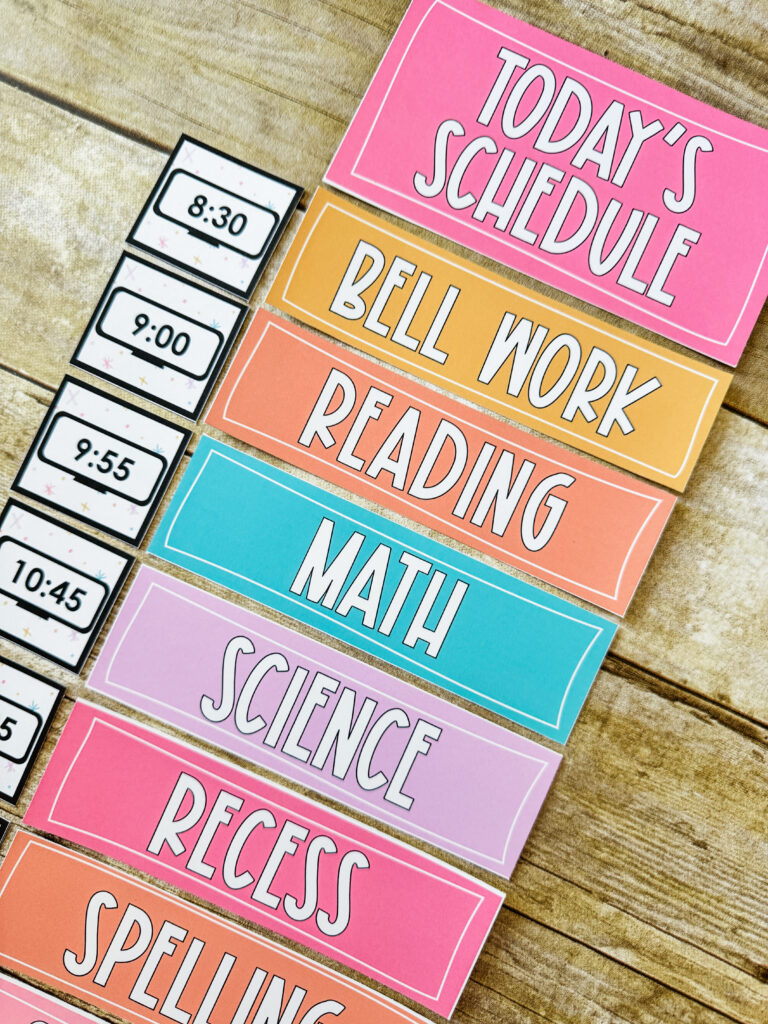 This image shows daily schedule cards for an upper elementary classroom. The cards include the subject title. There is a clock next to each subject showing the time for the subject.