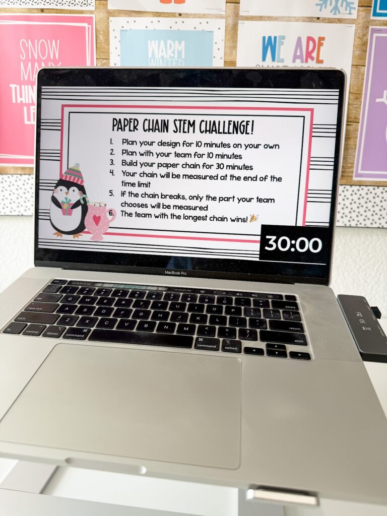 This image shows a list of directions for a STEM activity. In the bottom corner is a winter pengiun.