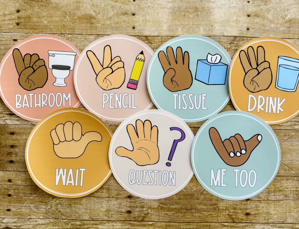 This image shows seven hand signal posters. The posters have a hand showing a certain number of fingers held up and an image that goes along with what students are asking. 