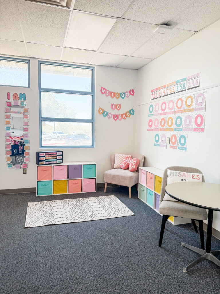 This image shows a cozy corner in a pastel classroom decor transformation.