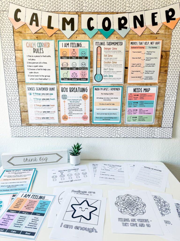 This image shows a calm corner display in front of a table in a classroom. There are lots of calming tools on the table, and expectations on the display.