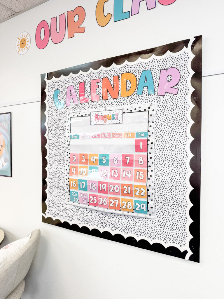 This image shows a close-up of a calendar display in a pastel classroom decor design.