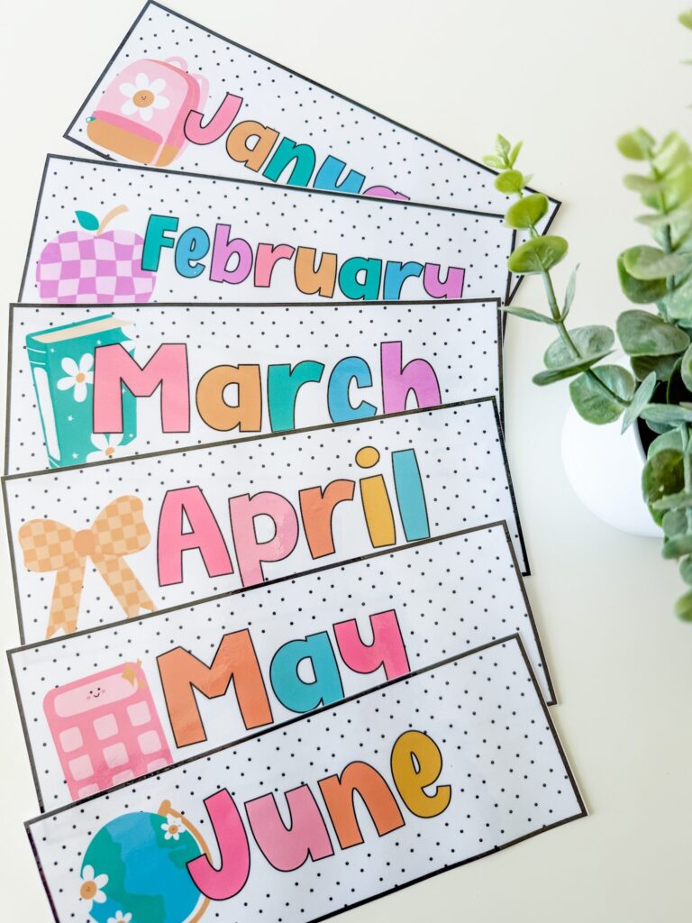 This image shows calendar month cards. Each card has the name of the month in bubble pastel colored letters and a clip art image that goes with each month.