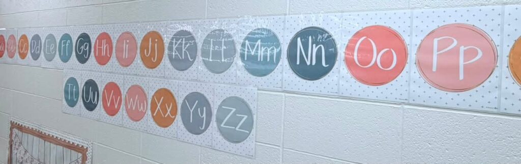 This image shows a close-up of the modern calm colors alphabet posters. 